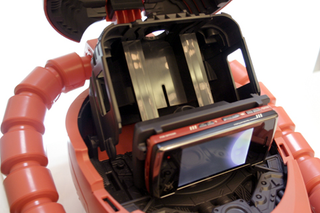 Illustration for article titled Japan Gets a Zaku 2-Style Helmet Phone from Sharp and Softbank